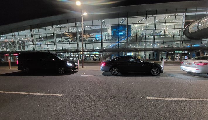 two-blacks-mercedes-benz-v-class-and-e-class-outside-dublin-airport-airport-transfer-from-dublin-airport.